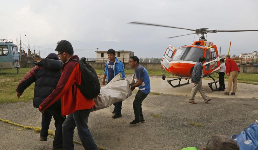 The body of a Macedonian 63-year-old Gjeorgi Petkov is unloaded from a helicopter at Teaching Hospital in Kathmandu, Nepal, Monday, May 21, 2018. Two foreign climbers, including Petkov, attempting to scale Mount Everest have died on the world&#x27;s highest peak, a Nepal mountaineering official said Monday. (AP Photo/Niranjan Shrestha) **FILE**