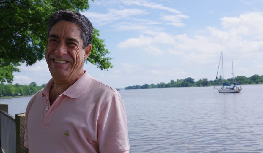 Andy Litsky, a longtime Advisory Neighborhood Commissioner in Ward 6, eyes taking a vacation after his six-year effort to bring the D.C. Circulator back to Southwest succeeded on May 22, 2018. The District Department of Transportation will restart the popular bus service on the Waterfront starting in June, with a modified route across M Street. (Julia Airey/The Washington Times)