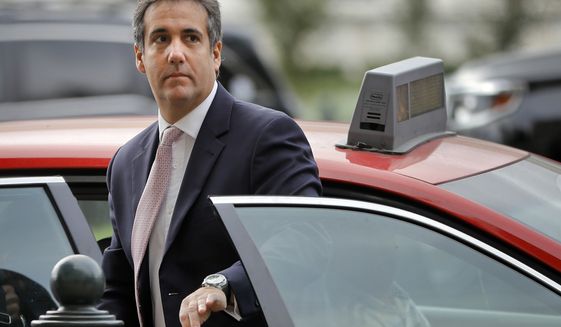 Michael Cohen, President Donald Trump&#39;s personal attorney, steps out of a cab during his arrival on Capitol Hill in Washington. Cohen&#39;s longtime business partner Evgeny Freidman pleaded guilty, Tuesday, May 22, 2018, to tax fraud in a deal that requires him to cooperate in any ongoing investigations. (AP Photo/Pablo Martinez Monsivais)