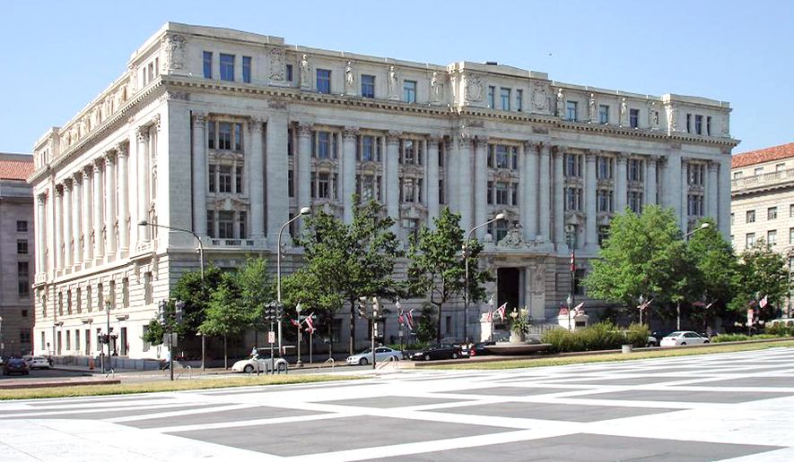 D.C. Council members were swept up in a flurry of activity at the John A. Wilson Building on Tuesday as they worked to resolve matters before the start of their two-month summer recess. (Associated Press/File) **FILE**