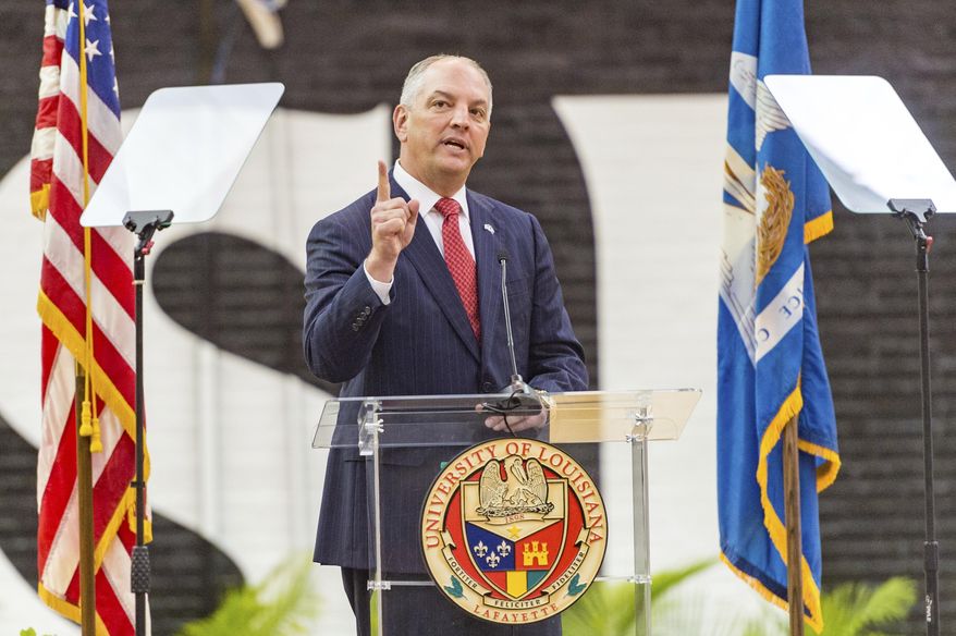 Louisiana Gov. John Bel Edwards delivers his opening address for the special legislative session at the Earl K. Long Gymnasium on the campus of the University of Louisiana-Lafayette, Tuesday, May 22, 2018, in Lafayette, La. (Scott Clause /The Daily Advertiser via AP)