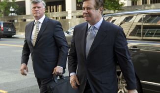 Paul Manafort, President Donald Trump&#39;s former campaign chairman, arrives at Federal District Court for a hearing, Wednesday, May 23, 2018, in Washington. ( AP Photo/Jose Luis Magana)
