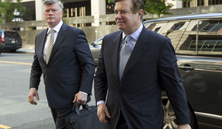 Paul Manafort, President Donald Trump&#x27;s former campaign chairman, arrives at Federal District Court for a hearing, Wednesday, May 23, 2018, in Washington. ( AP Photo/Jose Luis Magana)