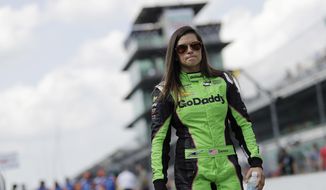 Danica Patrick walks down pit lane during qualifications for the IndyCar Indianapolis 500 auto race at Indianapolis Motor Speedway, in Indianapolis Sunday, May 20, 2018. (AP Photo/Darron Cummings)
