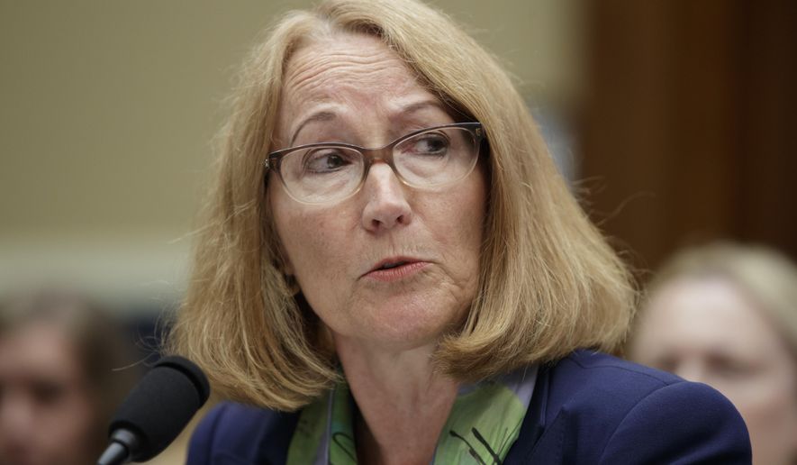 U.S. Olympic Committee Acting CEO Susanne Lyons testifies before the House Commerce Oversight and Investigations Subcommittee about the Olympic community&#39;s ability to protect athletes from sexual abuse, on Capitol Hill in Washington, Wednesday, May 23, 2018. (AP Photo/J. Scott Applewhite)