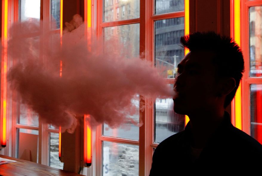 Use of electronic cigarettes has reached epidemic levels among minors and is an unacceptable trade-off for helping adults wean off regular cigarettes, the Food and Drug Administration says. (Associated Press/File)