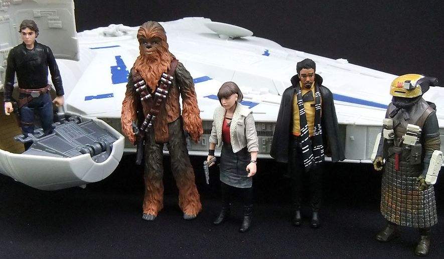 Hasbro&#x27;s &quot;Solo: A Star Wars Story&quot; Kessel Run Millennium Falcon along with some of the Force Link 2.0, 3.75-inch action figure collection that includes Han Solo, Chewbacca, Corellia Qi&#x27;ra, Lando Calrissian and a Kessel Guard. (Photograph by Joseph Szadkowski / The Washington Times)