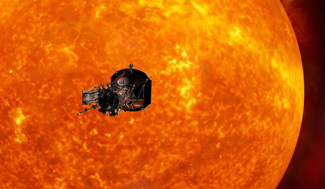 This image made available by the Johns Hopkins University Applied Physics Laboratory on Wednesday, May 31, 2017 depicts NASA&#x27;s Solar Probe Plus spacecraft approaching the sun. On Wednesday, NASA announced it will launch the probe in summer 2018 to explore the solar atmosphere. It will be subjected to brutal heat and radiation like no other man-made structure before. (Johns Hopkins University Applied Physics Laboratory via AP)