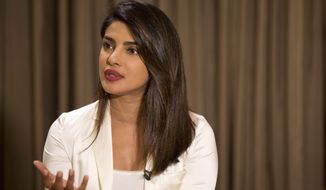 Priyanka Chopra, Indian Bollywood actor and UNICEF Goodwill Ambassador, speaks during an interview with The Associated Press in Dhaka, Bangladesh, Thursday, May 24, 2018. (AP Photo/A.M. Ahad)
