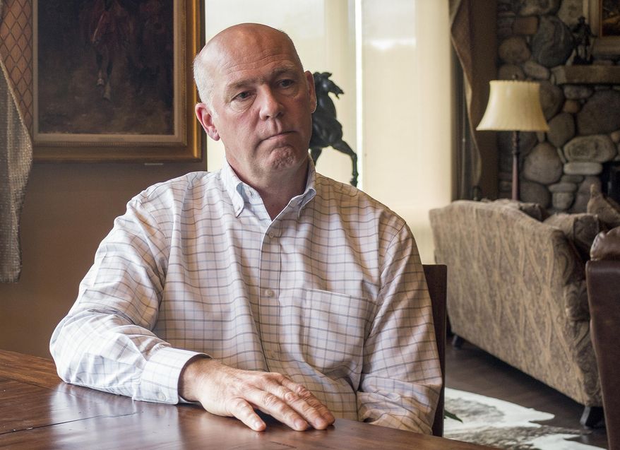 FILE--In this June 20, 2017, file photo, Montana Rep.-elect Greg Gianforte responds to questions at his home in Bozeman, Mont., about an election-eve confrontation with a reporter. The head of the Montana Democratic Party on Thursday, May 24, 2018, asked for a congressional ethics investigation into whether Gianforte lied to the police and the public when he assaulted a reporter last year. (AP Photo/Bobby Caina Calvan, file)