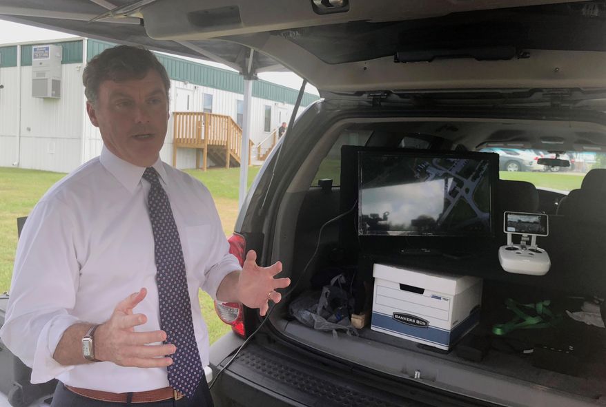 South Carolina Department of Corrections Director Bryan Stirling shows a monitor and drone camera equipment in Columbia, SC., Thursday, May 24, 2018. The drones will be used to monitor safety and contraband smuggling at state prisons. Stirling said South Carolina is the first state in the nation to use drones like this. (AP Photo/Meg Kinnard)