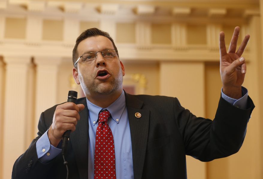 State Sen. Thomas Garrett, R-Buckingham, speaks during a debate on a bill that would deny in-state tuition to certain immigrants, during the Senate session at the Capitol in Richmond, Va., Tuesday, Jan. 20, 2015. The bill failed to pass. (AP Photo/Steve Helber) **FILE**