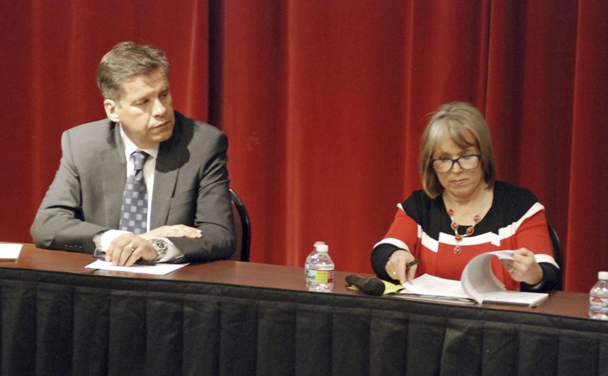 In this April 5, 2018 photo, candidates for New Mexico governor participate in a policy forum in Albuquerque, N.M., attended by state Sen. Joseph Cervantes, left, of Las Cruces, and U.S. Rep. Michelle Lujan Grisham of Albuquerque. New Mexico's next governor will inherit simmering discontent over teacher pay and evaluations, urgent calls to expand early childhood schooling and a lawsuit that may put the judiciary in charge of pivotal education funding decisions. (AP Photo/Morgan Lee)