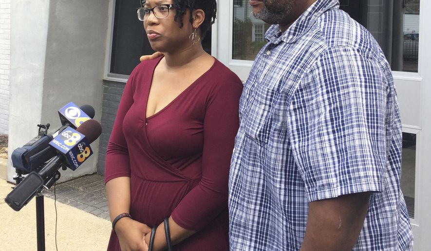Princess Blanding, the sister of Marcus-David Peters, who was fatally shot by Richmond police and Jeffrey Peters, the uncle of Marcus-David Peters, speak to the media outside Richmond police headquarters in Richmond, Va., Wednesday May 23, 2018. The two viewed police body-camera footage of the incident. (AP Photo/Denise Lavoie)