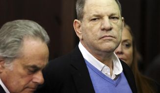 Harvey Weinstein, right, appears at his arraignment with his lawyer Benjamin Brafman, in Manhattan Criminal Court on Friday, May 25, 2018 in New York. Weinstein is charged with two counts of rape and one count of criminal sexual act. He was released on $1 million dollars bail. (Jefferson Siegel/New York Daily News via AP, Pool)