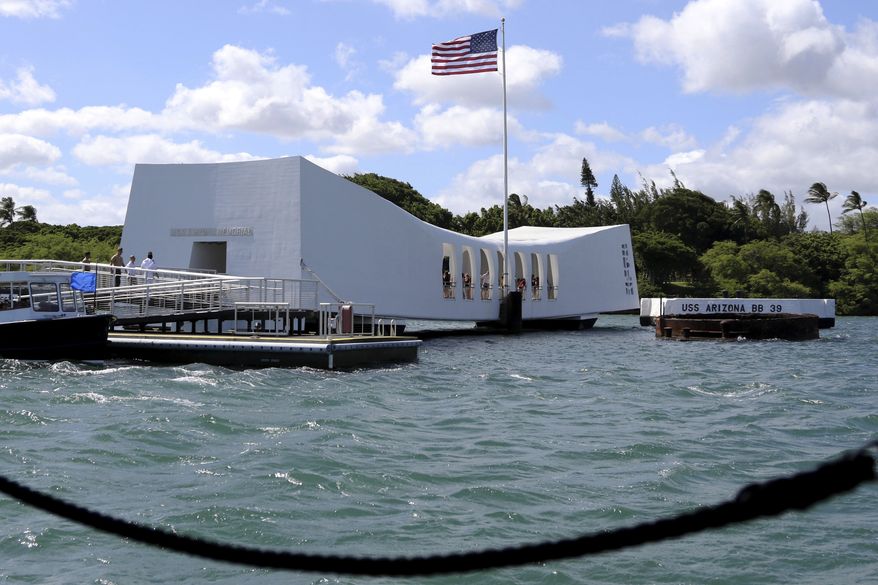 FILE - This Thursday, Sept. 21, 2017 file photo shows the USS Arizona Memorial in Pearl Harbor, Hawaii. On Friday, May 25, 2018, officials said damage to the memorial is worse than expected and it will remain closed indefinitely. (AP Photo/Caleb Jones)