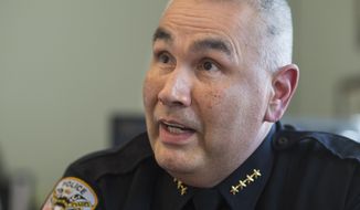 In this April 4, 2018 photo, Police Chief Ed Mercer speaks about his job at the Juneau Police Department in Juneau, Alaska. Mercer, by all accounts, is the department&#39;s first Alaska Native chief of police. Raised in Sitka, Mercer is of a Tlingit of the Coho clan of the Raven moiety. (Michael Penn/Juneau Empire via AP)