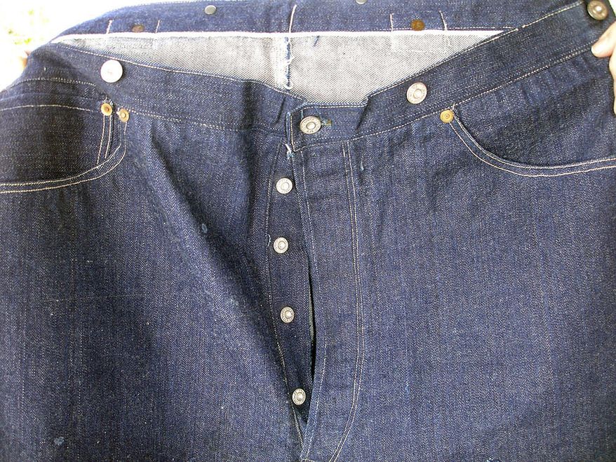 This undated photo provided by Daniel Buck Auctions, of Lisbon Falls, Maine, shows a portion of a pair of 125-year-old Levi Strauss & Co., denim blue jeans that sold for nearly $100,000 this in May 2018 to a buyer in Asia. The jeans were purchased in 1893 by a store keeper in the Arizona Territory and were in pristine condition because they were worn only a few times. (Daniel Buck Soules/Daniel Buck Auctions via AP) ** FILE **