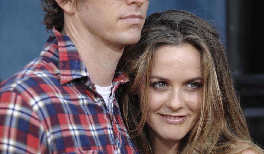 FILE - In this Thursday July 31, 2008 file photo, Christopher Jarecki and Alicia Silverstone arrive at the premiere of &amp;quot;Pineapple Express&amp;quot; in Mann Village Theater in Los Angeles. Alicia Silverstone is divorcing her husband of nearly 13 years. The “Clueless” actress filed for divorce from Christopher Jarecki on Friday, May 25, 2018 in Los Angeles County Superior Court. (AP Photo/Chris Pizzello, File)