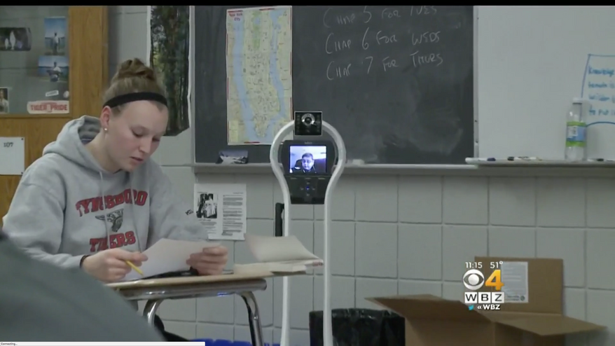 13-year-old Keegan Concannon, who has an immunodeficiency disorder and makes it to class less than half the time, won the right to use his robot as part of a settlement under the Americans with Disabilities Act. (WBZ-TV screenshot)