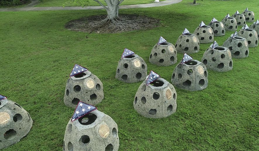 This Sunday, May 27, 2018, photo provided by Eternal Reefs shows a part of the On Eternal Patrol Memorial Reef in Sarasota, Fla., that will be installed on the ocean floor about 9 miles off the coast of Sarasota. The monument will honor more than 4,000 officers and crew members who have died while serving aboard American military submarines since 1900. Subtropical Storm Alberto’s crossing of the Gulf of Mexico delayed the installation of the first ball Monday. (LSK Drones/EternalReefs.com via AP)