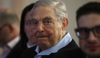 George Soros, founder and chairman of the Open Society Foundations, listens to the conference after his speech titled &quot;How to save the European Union&quot; as he attends the European Council On Foreign Relations Annual Council Meeting in Paris, Tuesday, May 29, 2018. (AP Photo/Francois Mori) ** FILE **