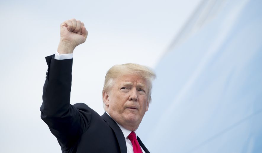 President Donald Trump gestures as he boards Air Force One at Andrews Air Force Base, Md., Tuesday, May 29, 2018, to travel to Nashville, Tenn. (AP Photo/Andrew Harnik)