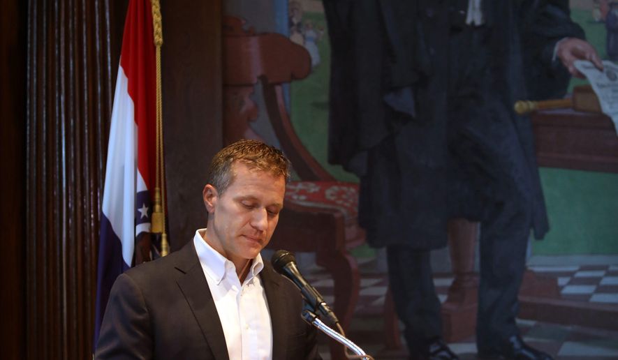 Missouri Gov. Eric Greitens announces his resignation in the governor's office, Tuesday, May 29, 2018, in Jefferson City, Mo. Greitens resigned amid a widening investigation that arose from an affair with his former hairdresser. He said his resignation would take effect Friday. (Robert Cohen/St. Louis Post-Dispatch via AP)