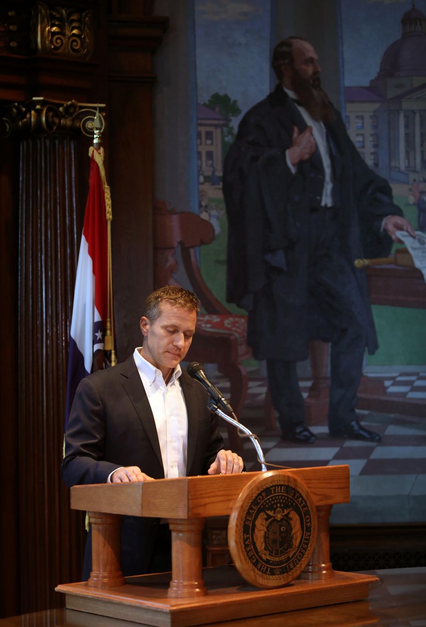 Missouri Gov. Eric Greitens announces his resignation in the governor's office, Tuesday, May 29, 2018, in Jefferson City, Mo. Greitens resigned amid a widening investigation that arose from an affair with his former hairdresser. He said his resignation would take effect Friday. (Robert Cohen/St. Louis Post-Dispatch via AP)