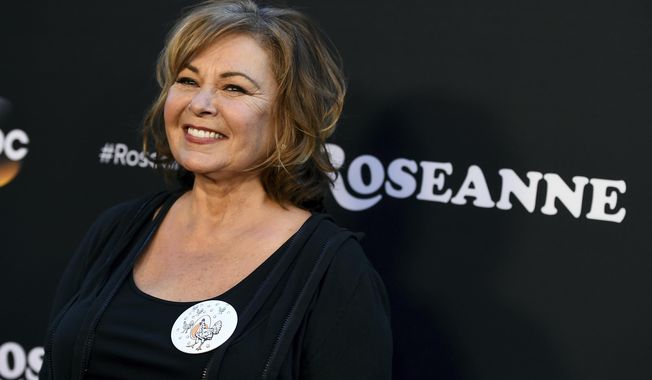 FILE - In this March 23, 2018, file photo, Roseanne Barr arrives at the Los Angeles premiere of &amp;quot;Roseanne&amp;quot; on Friday in Burbank, Calif.  Barr has apologized for suggesting that former White House adviser Valerie Jarrett is a product of the Muslim Brotherhood and the “Planet of the Apes.” Barr on Tuesday, May 29, tweeted that she was sorry to Jarrett “for making a bad joke about her politics and her looks.” Jarrett, who is African-American, advised Barack and Michelle Obama. (Photo by Jordan Strauss/Invision/AP, File)