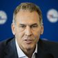 FILE - In this May 11, 2018, file photo, Philadelphia 76ers general manager Bryan Colangelo speaks during a news conference at the NBA basketball team&#x27;s practice facility in Camden, N.J. Colangelo is denying a report connecting the executive to Twitter accounts that criticized Sixers players Joel Embiid and Markelle Fultz, among other NBA figures. The accounts also took aim at former Sixers GM Sam Hinkie, Toronto Raptors executive Masai Ujiri and former Sixers players Jahlil Okafor and Nerlens Noel, according to a report by The Ringer. (AP Photo/Matt Rourke, File) **FILE**