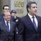 President Donald Trump&#39;s personal attorney Michael Cohen, right, leaves Federal Court, in New York, Wednesday, May 30, 2018. Cohen&#39;s attorney Stephen Ryan is at left. (AP Photo/Richard Drew)