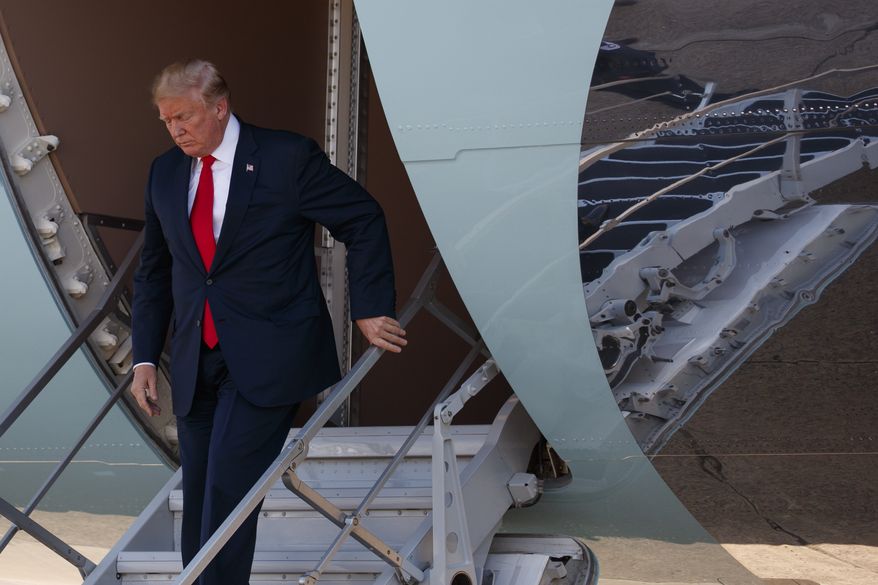 President Donald Trump walks down the steps of Air Force One after arriving at Dallas Love Field airport, Thursday, May 31, 2018, in Dallas. (AP Photo/Evan Vucci)
