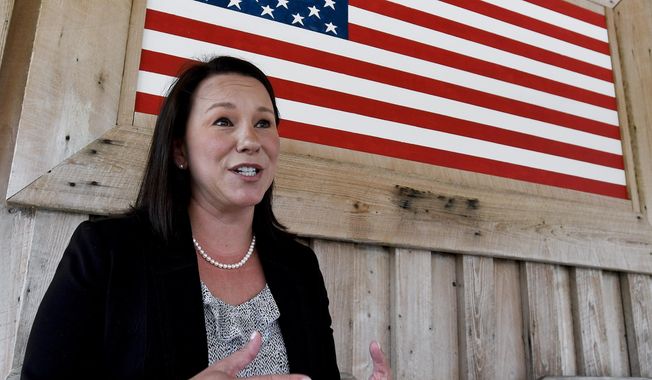 U.S. Representative Martha Roby pauses to talk with the media while campaigning at a fish fry in Andalusia, Ala., on Wednesday May 30, 2018. (Mickey Welsh /The Montgomery Advertiser via AP)