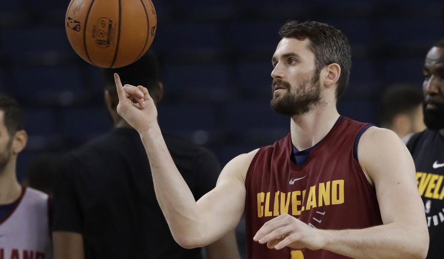 Cleveland Cavaliers' Kevin Love juggles a basketball during an NBA basketball practice, Wednesday, May 30, 2018, in Oakland, Calif. The Cavaliers face the Golden State Warriors in Game 1 of the NBA Finals on Thursday in Oakland. (AP Photo/Marcio Jose Sanchez)