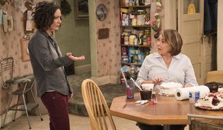 This image released by ABC shows Sara Gilbert, left, and Roseanne Barr in a scene from &amp;quot;Roseanne.&amp;quot; The unprecedented sudden cancellation of TV’s top comedy has left a wave of unemployment and uncertainty in its wake. Barr’s racist tweet and the almost immediate axing of her show put hundreds of people out of work. (Greg Gayne/ABC via AP)