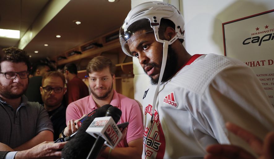 Washington Capitals right wing Devante Smith-Pelly, answers questions for members of the media following practice in Arlington, Va., Friday, June 1, 2018. Game 3 of the Stanley Cup NHL hockey finals between the Vegas Golden Knights and Capitals is scheduled for Saturday. (AP Photo/Pablo Martinez Monsivais)
