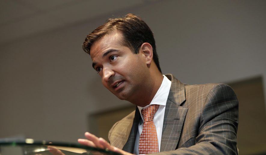 In this Tuesday, May 29, 2018 photo, Rep. Carlos Curbelo, R-Fla., speaks during an interview in Homestead, Fla. (AP Photo/Lynne Sladky) ** FILE **