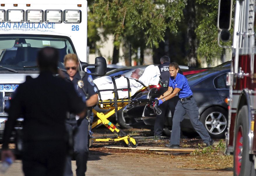 FILE - In this Sept. 13, 2017 file photo, a woman is transported from The Rehabilitation Center at Hollywood Hills as patients are evacuated after a loss of air conditioning due to Hurricane Irma in Hollywood, Fla. A government agency reports that most Florida nursing homes and assisted-living facilities do not have backup power despite new requirements enacted after a dozen people died in a sweltering center following Hurricane Irma. The state Agency for Health Care Administration says only 48 nursing homes and 91 assisted-living facilities say they have installed equipment and had state inspections as of May 25, 2018. The new rules that went into effect Friday require all facilities to have backup power for cooling for at least 96 hours. (Amy Beth Bennett/South Florida Sun-Sentinel via AP)