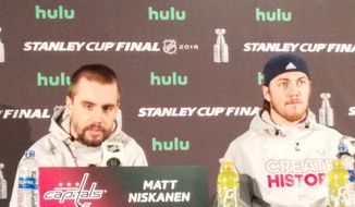 Matt Niskanen (left) and T.J. Oshie of the Washington Capitals speak to the media at Kettler Capitals Iceplex in Arlington, Va., on Sunday, June 3, 2018, one day after they won Game 3 of the Stanley Cup Final over the Vegas Golden Knights. (Photo by Adam Zielonka / Washington Times)