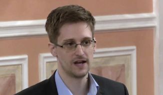 In this file image made from video released by WikiLeaks on Oct. 11, 2013, former National Security Agency systems analyst Edward Snowden speaks in Moscow. (AP Photo, File)