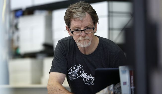Baker Jack Phillips, owner of Masterpiece Cakeshop, manages his shop after the U.S. Supreme Court ruled that he could refuse to make a wedding cake for a same-sex couple because his religious beliefs did not violate Colorado&#x27;s anti-discrimination law Monday, June 4, 2018, in Lakewood, Colo. (AP Photo/David Zalubowski) **FILE**
