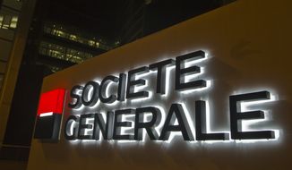 The logo of the Societe General bank is pictured at the business district La Defense, in Paris Wednesday, Oct. 12, 2016. (AP Photo/Michel Euler)
