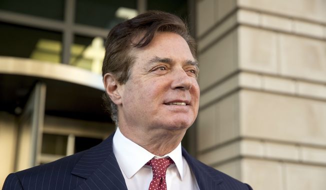 Paul Manafort telephoned a former business associate identified as &quot;D1,&quot; who ended the call and at some point reported the contact to special counsel Robert Mueller&#x27;s investigative team, prosecutors say. (Associated Press/File)