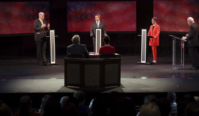 Democratic governor candidates Phil Noble, Rep. James Smith and Marguerite Willis participate in a gubernatorial primary debate at the University of South Carolina in Columbia, S.C., Monday, June 4, 2018. (Grace Beahm Alford/The Post And Courier via AP, Pool)