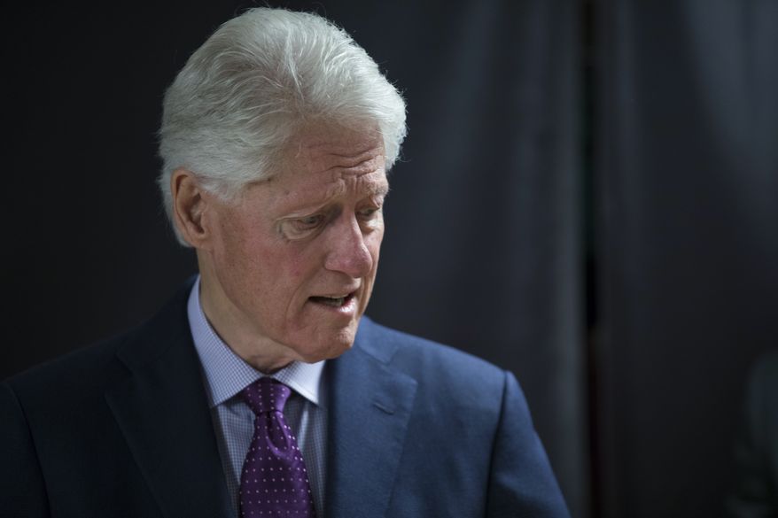 Former President Bill Clinton testified to investigators that he did not want to snub Attorney General Loretta E. Lynch when he walked the 30 yards from his private jet to hers. He told her she was doing a great job and that she was his favorite Cabinet secretary. (Associated Press/File)


