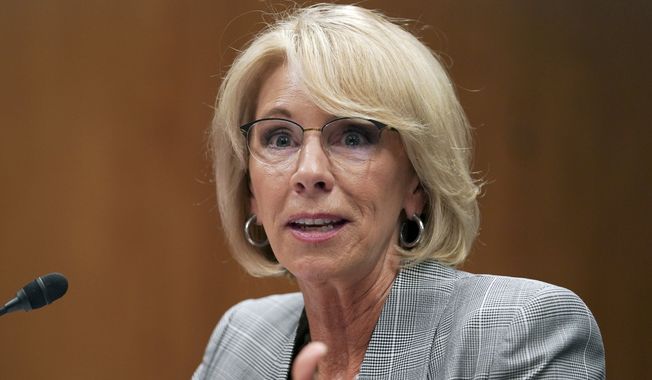 Education Secretary Betsy DeVos testifies during a Senate Subcommittee on Labor, Health and Human Services, Education, and Related Agencies Appropriations hearing to review the Fiscal Year 2019 funding request and budget justification for the U.S. Department of Education on Capitol Hill in Washington, Tuesday, June 5, 2018. (AP Photo/Carolyn Kaster)