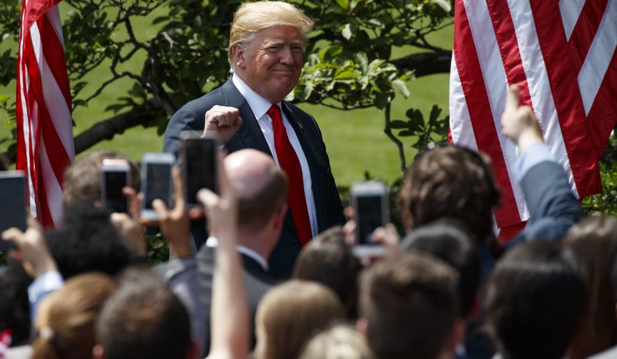 President Donald Trump pumps his fist as he arrives to a &quot;Celebration of America&quot; event at the White House, Tuesday, June 5, 2018, in Washington, in lieu of a Super Bowl celebration for the NFL&#x27;s Philadelphia Eagles that he canceled.  (AP Photo/Evan Vucci)