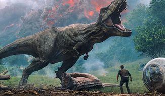 This image released by Universal Pictures shows a scene from the upcoming &amp;quot;Jurassic World: Fallen Kingdom.&amp;quot; (Universal Pictures via AP)