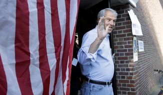Bob Hugin, a Republican candidate running in New Jersey primary election for U.S. Senate, gestures while exiting his polling place after casting his vote in the New Jersey Primary Election, Tuesday, June 5, 2018, at the Lincoln-Hubbard School in Summit, N.J. (AP Photo/Julio Cortez)